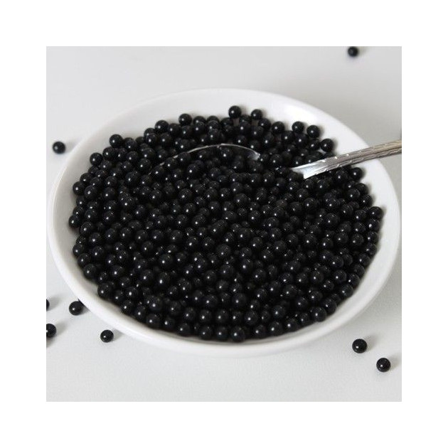 Perles de sucre Noir Brillant disposees dans un bol Perles de sucre Noir Brillant disposees dans un bol