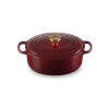 Cocotte en Fonte Ovale 29 cm Garnet Bouton Doré Le Creuset Signature
