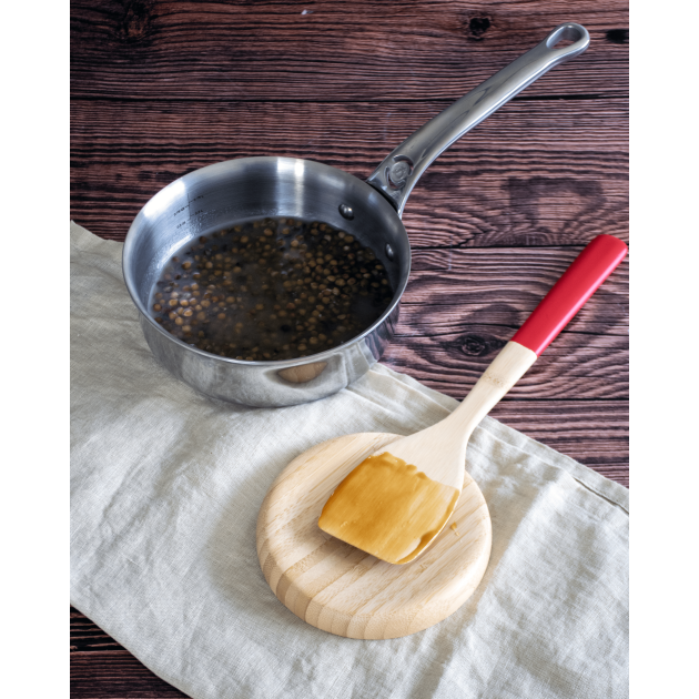 Pose cuillère de cuisine en bois