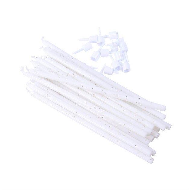 Bougies blanches à paillettes déballées